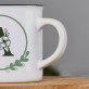 Monogram w kole kwiaty - Kubek ceramiczny z czarnym rantem